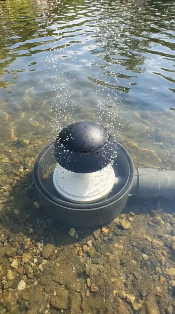 Aerated bottom drain pond floor